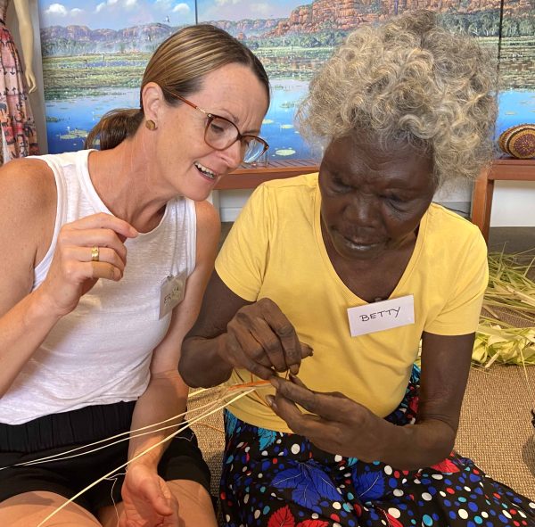 Betty Millikens, Aboriginal artist and weaving, teaching Pandanus weaving workshop at Songlines Gallery Darwin