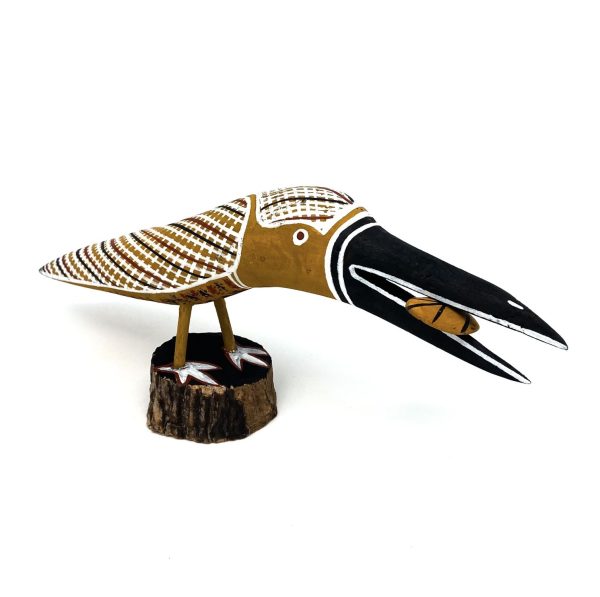 Kookaburra bird sculpture carving made by Elah Yunupingu and Barbara Wanambi at Songlines Gallery Darwin