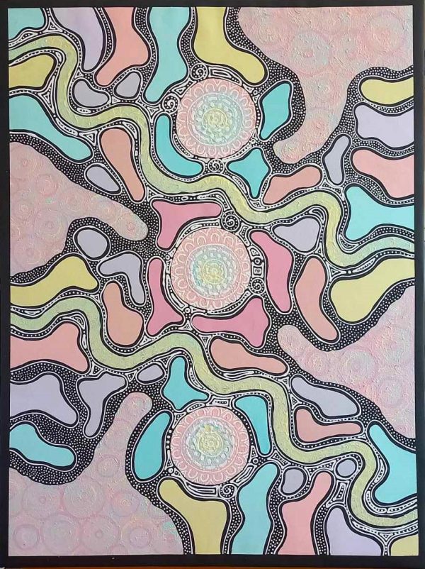 Marie Napurulla Aboriginal artist dot painting in pastel colours at Songlines art gallery in Darwin