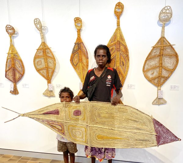 Rebecca Njinimnjuma and pandanus fish at Songlines Gallery