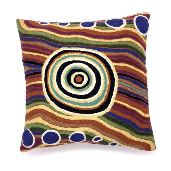 Wool chain stitch cushion cover designed by Aboriginal artist Yaritji Heffernan of the APY Lands and made by Better World Arts. Available from Songlines Gallery in Darwin