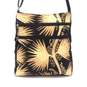 Delia crossbody bag in sand palm fabric designed by Gracie Kumbi from Merrepen Arts made by Flying Fox Fabrics